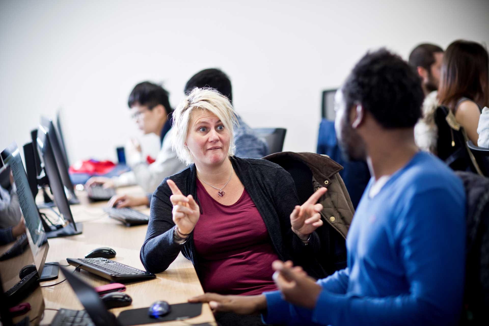 A study support worker with a student